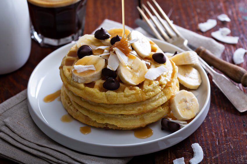 Waffles with banana slices, caramel and chocolate