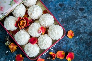 White chocolate truffles covered with coconut shavings